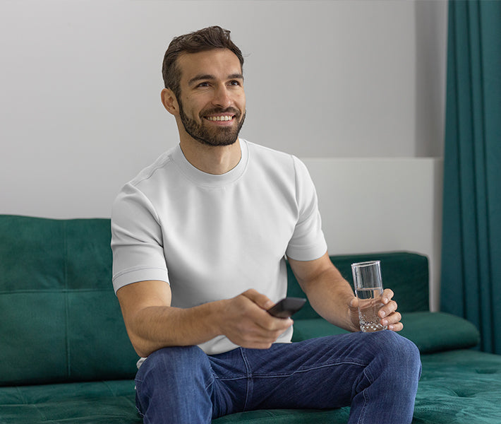 Fioboc man wearing white t-shirt  watching