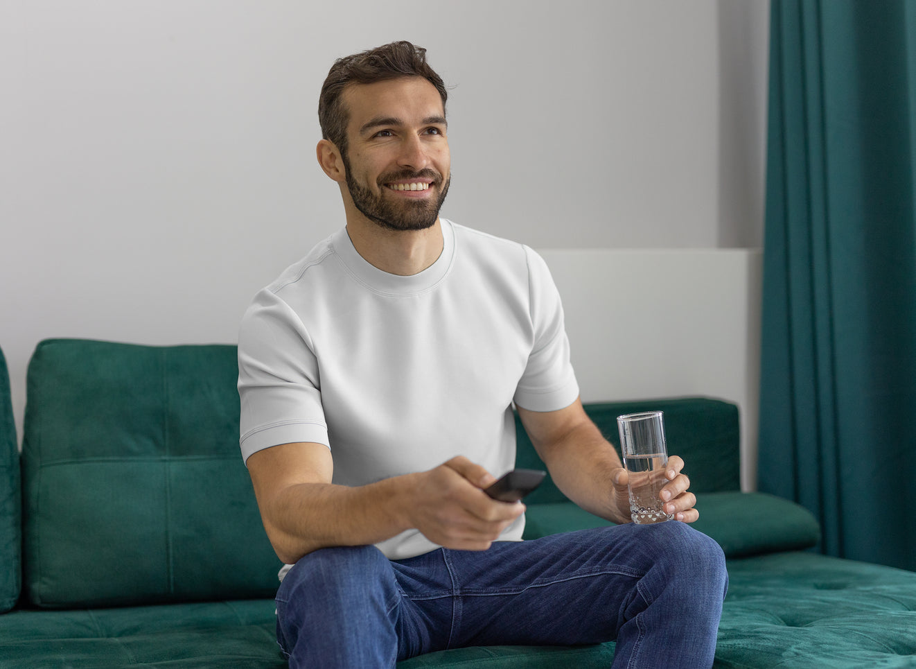 Fioboc man wearing white t-shirt  watching
